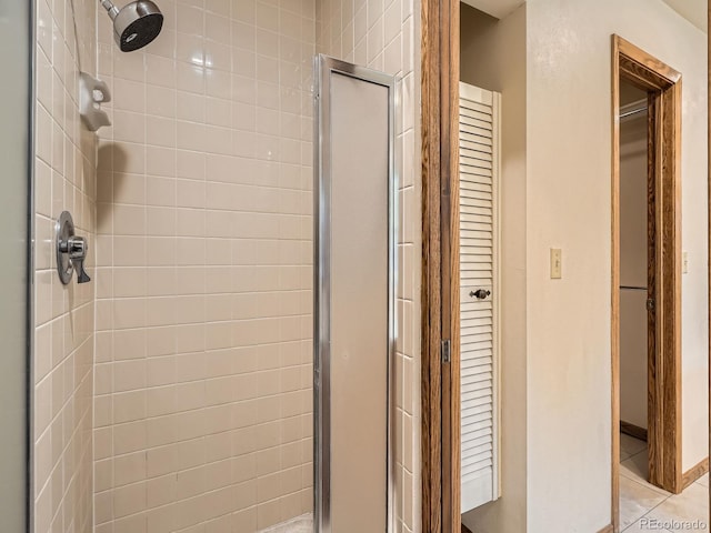 bathroom featuring tile patterned floors and walk in shower