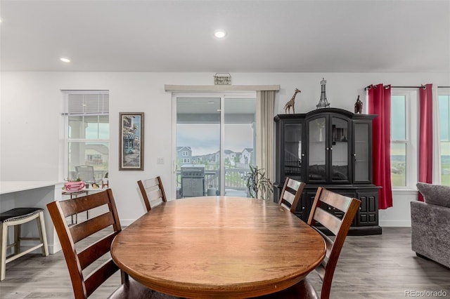 17471 Gandy Dancer Ln, Parker, CO 80134 - dining area featuring wood finished floors and recessed lighting