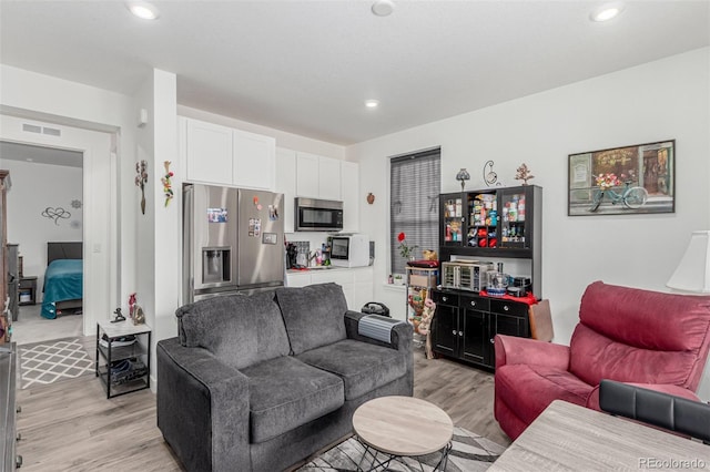 17471 Gandy Dancer Ln, Parker, CO 80134 - living room with light wood-type flooring and recessed lighting