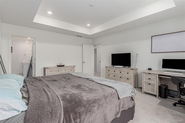 17471 Gandy Dancer Ln, Parker, CO 80134 - bedroom with a tray ceiling, light carpet, recessed lighting, a desk, and ensuite bath