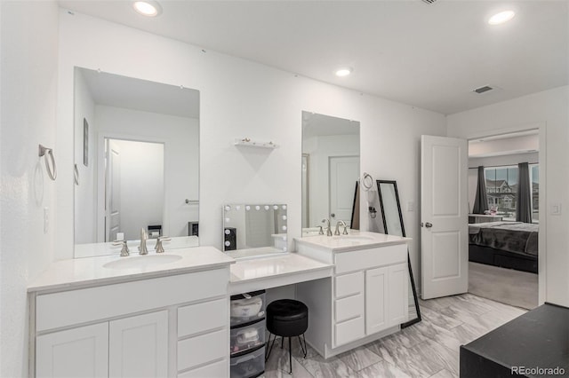 17471 Gandy Dancer Ln, Parker, CO 80134 - full bathroom featuring ensuite bath, two vanities, and recessed lighting