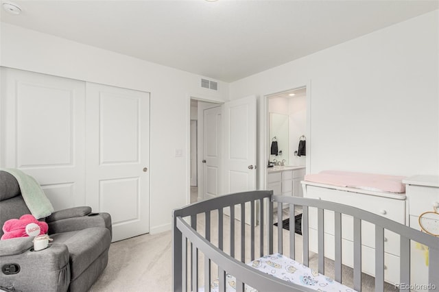 17471 Gandy Dancer Ln, Parker, CO 80134 - bedroom featuring light colored carpet, a closet, and a nursery area