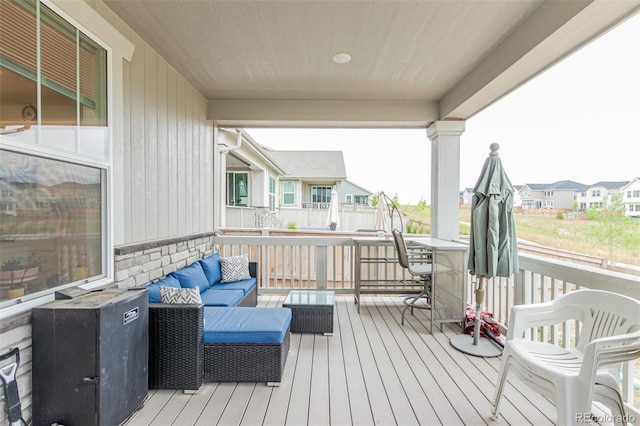 17471 Gandy Dancer Ln, Parker, CO 80134 - wooden deck featuring outdoor lounge area and a residential view