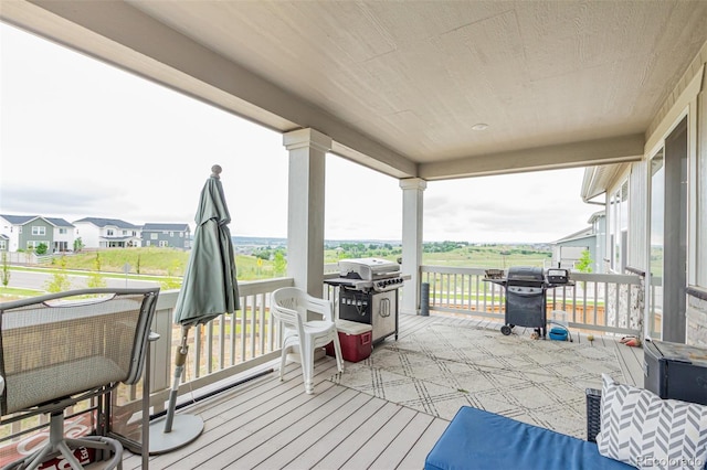 17471 Gandy Dancer Ln, Parker, CO 80134 - wooden deck featuring a grill