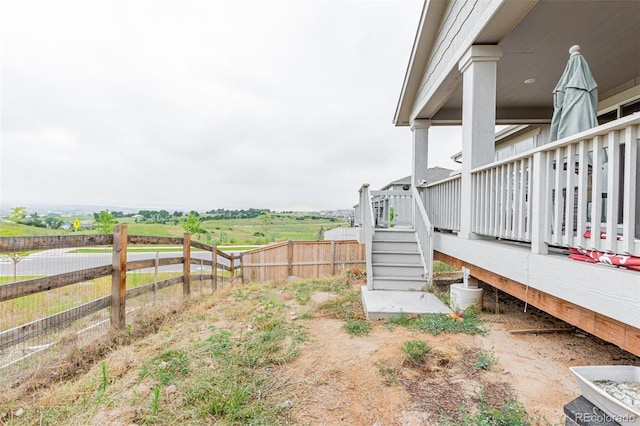 17471 Gandy Dancer Ln, Parker, CO 80134 - view of yard featuring stairs and a view of rural / pastoral area