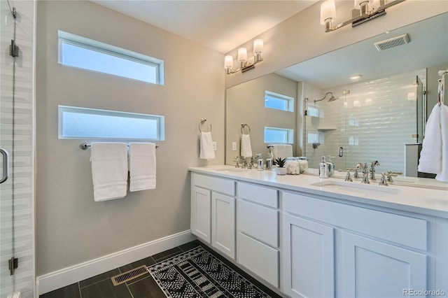 6864 Bryant Ct, Denver, CO 80221 - full bath with a stall shower, baseboards, and double vanity