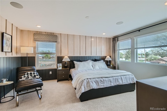 6864 Bryant Ct, Denver, CO 80221 - bedroom with wooden walls and light colored carpet