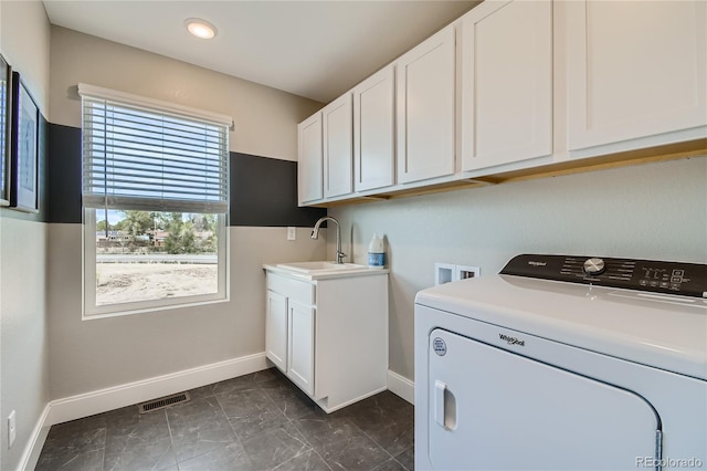 6864 Bryant Ct, Denver, CO 80221 - laundry room featuring washer / clothes dryer, baseboards, cabinet space, dark marble finish floors, and recessed lighting