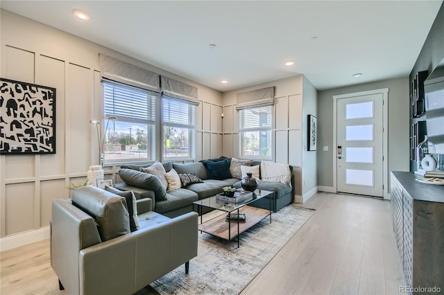 6864 Bryant Ct, Denver, CO 80221 - living room featuring light wood-type flooring, baseboards, and recessed lighting