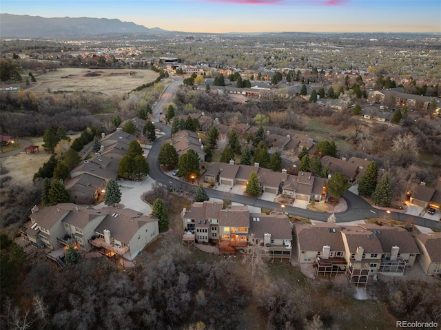 2854 Tenderfoot Hill St, Colorado Springs, CO 80906 - aerial view at dusk with a mountain view and a residential view
