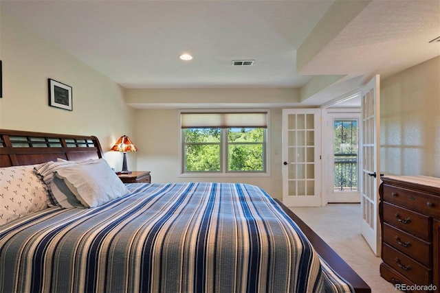 2854 Tenderfoot Hill St, Colorado Springs, CO 80906 - carpeted bedroom featuring visible vents and access to exterior