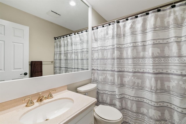 2854 Tenderfoot Hill St, Colorado Springs, CO 80906 - bathroom with curtained shower, vanity, and toilet