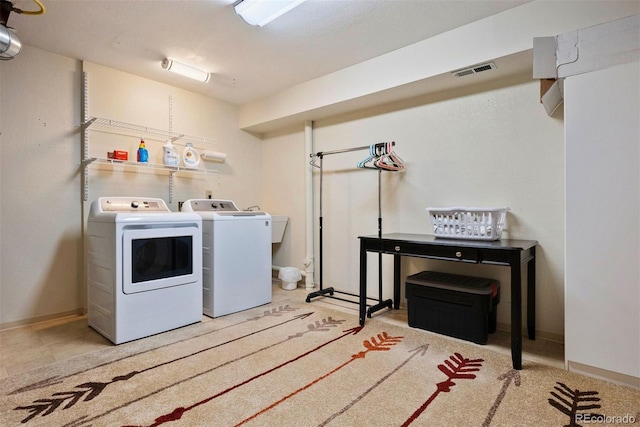 2854 Tenderfoot Hill St, Colorado Springs, CO 80906 - laundry room with washer and clothes dryer and baseboards