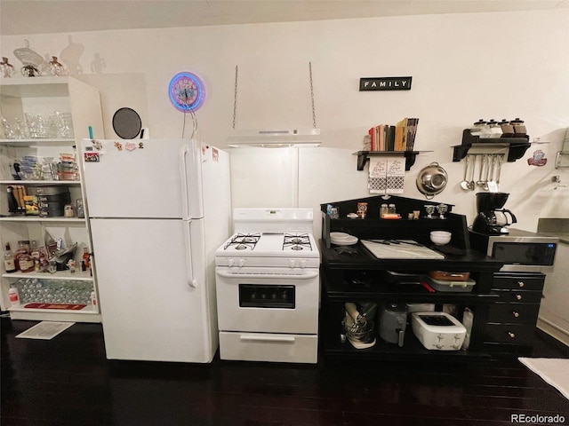 kitchen with wood finished floors, under cabinet range hood, and white appliances
