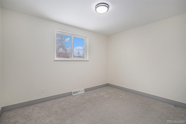 view of carpeted spare room