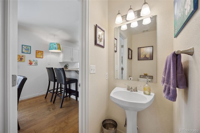bathroom with wood finished floors
