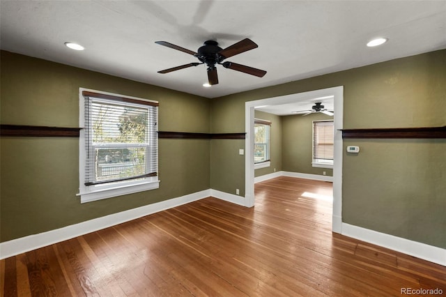 702 E Platte Ave, Colorado Springs, CO 80903 - unfurnished room with a ceiling fan, baseboards, wood-type flooring, and recessed lighting