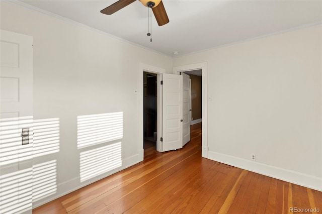 702 E Platte Ave, Colorado Springs, CO 80903 - unfurnished bedroom featuring light wood-style flooring, baseboards, crown molding, and ceiling fan
