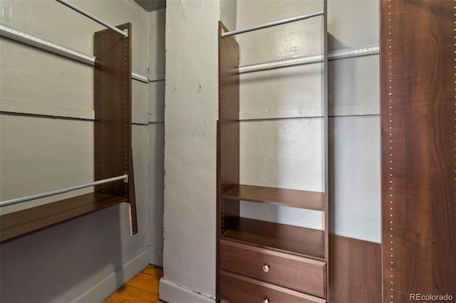 702 E Platte Ave, Colorado Springs, CO 80903 - spacious closet featuring wood finished floors