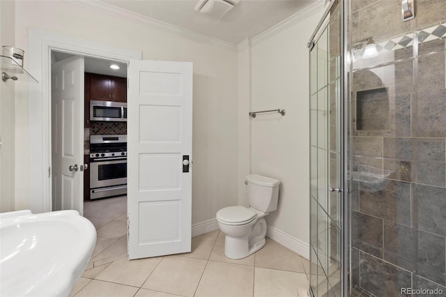 702 E Platte Ave, Colorado Springs, CO 80903 - bathroom featuring ornamental molding, a shower stall, baseboards, toilet, and tile patterned flooring