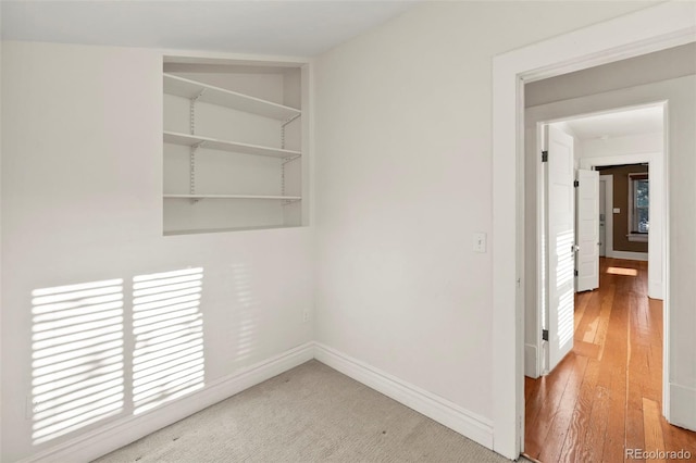 702 E Platte Ave, Colorado Springs, CO 80903 - spare room featuring baseboards and hardwood / wood-style floors