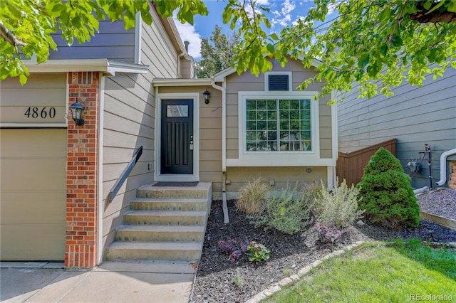 entrance to property with a garage