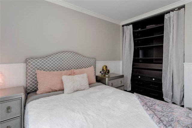 bedroom with ornamental molding