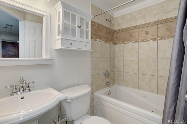 full bathroom with shower / tub combo with curtain, sink, and toilet