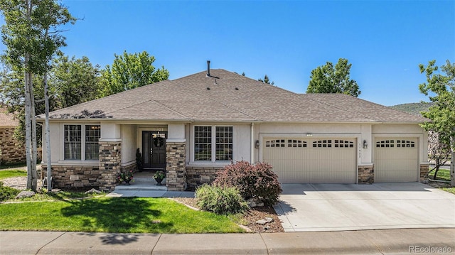 11422 W Cooper Ave, Littleton, CO 80127 - view of front of home with stone siding, an attached garage, stucco siding, driveway, and a shingled roof
