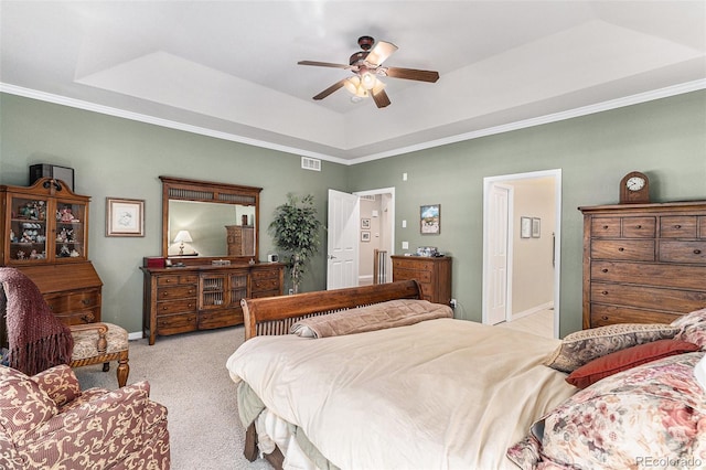 11422 W Cooper Ave, Littleton, CO 80127 - bedroom featuring a raised ceiling, carpet, baseboards, crown molding, and ceiling fan