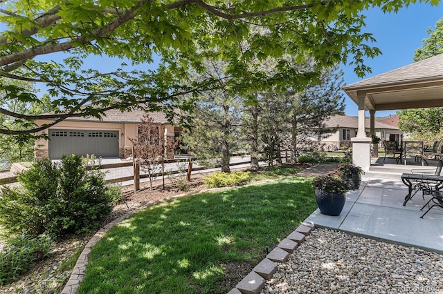 11422 W Cooper Ave, Littleton, CO 80127 - view of grassy yard featuring a garage