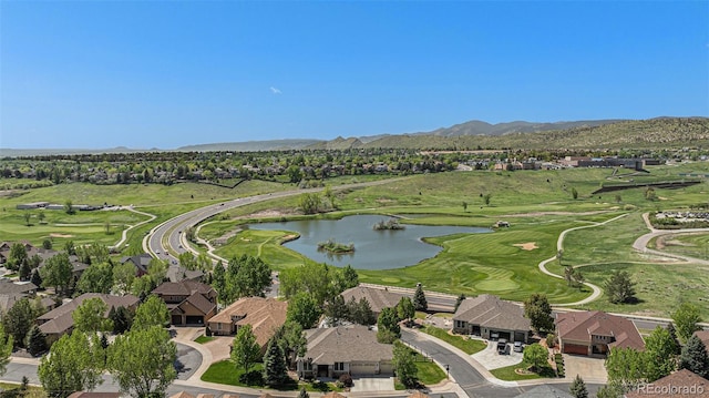 11422 W Cooper Ave, Littleton, CO 80127 - aerial overview of property's location with a water and mountain view, nearby suburban area, and a golf club