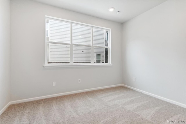 unfurnished room featuring carpet floors