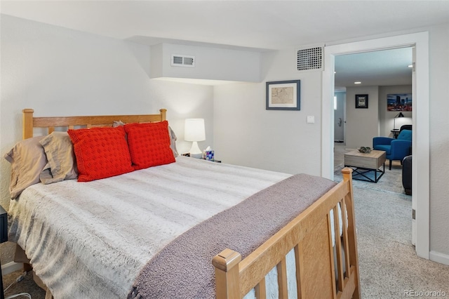 bedroom featuring visible vents and carpet floors