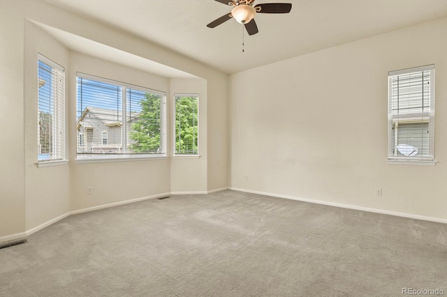 297 N Coolidge Way, Aurora, CO 80018 - carpeted empty room with ceiling fan and baseboards