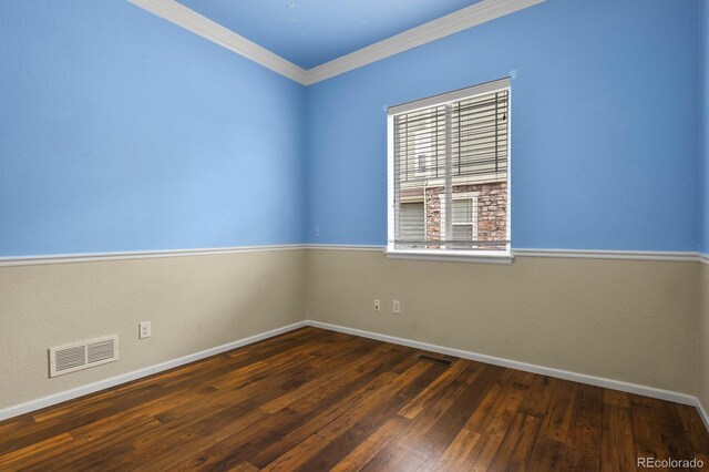 297 N Coolidge Way, Aurora, CO 80018 - unfurnished room with baseboards, hardwood / wood-style flooring, and ornamental molding