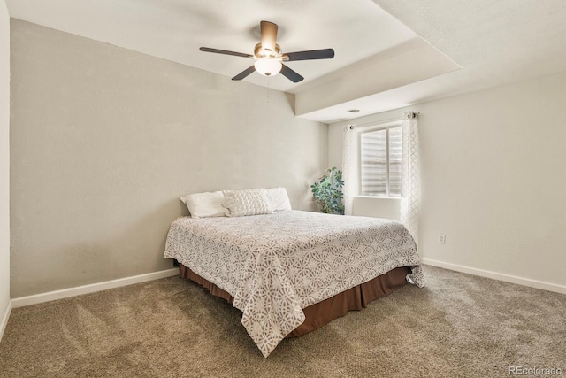 297 N Coolidge Way, Aurora, CO 80018 - bedroom featuring carpet, baseboards, and ceiling fan