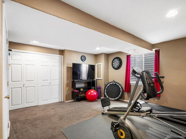 exercise room with carpet floors