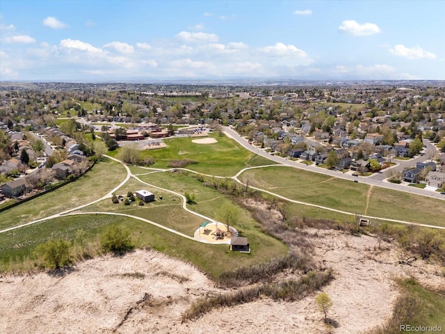 aerial view of property's location with nearby suburban area