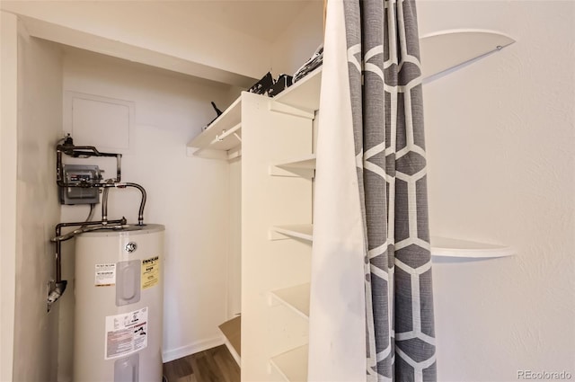 utility room with water heater