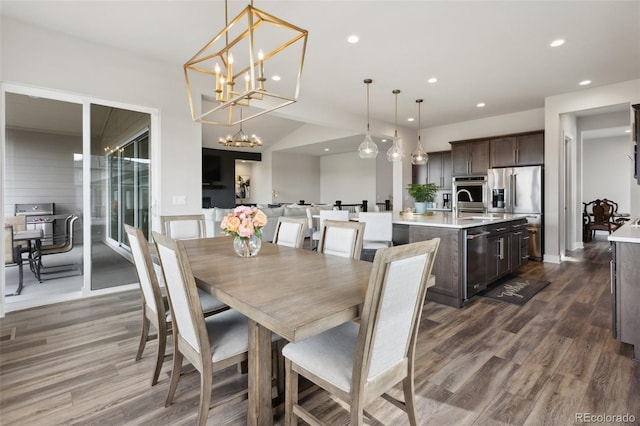 dining area with recessed lighting, baseboards, and dark wood finished floors