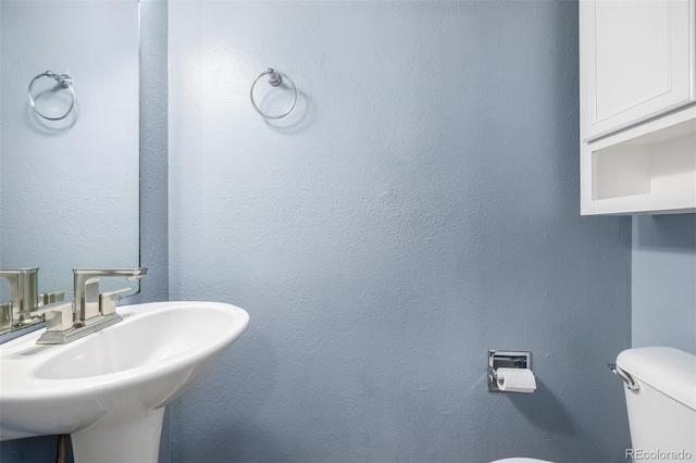 8023 Wolff St Unit C, Westminster, CO 80031 - bathroom featuring a sink and toilet