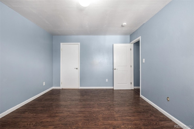8023 Wolff St Unit C, Westminster, CO 80031 - spare room featuring wood finished floors and baseboards