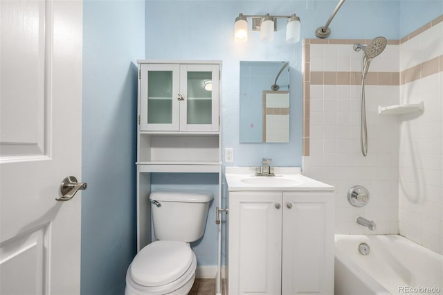8023 Wolff St Unit C, Westminster, CO 80031 - bathroom featuring toilet, vanity, and tub / shower combination