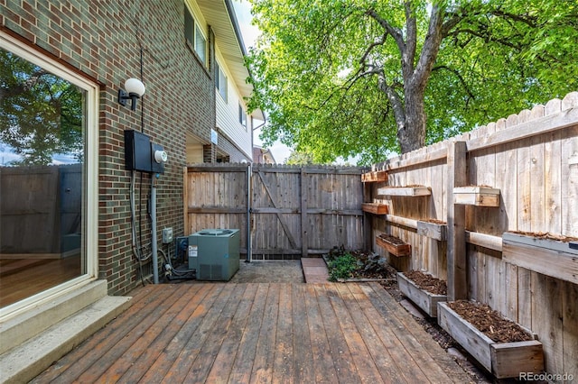 8023 Wolff St Unit C, Westminster, CO 80031 - wooden deck featuring fence and central AC
