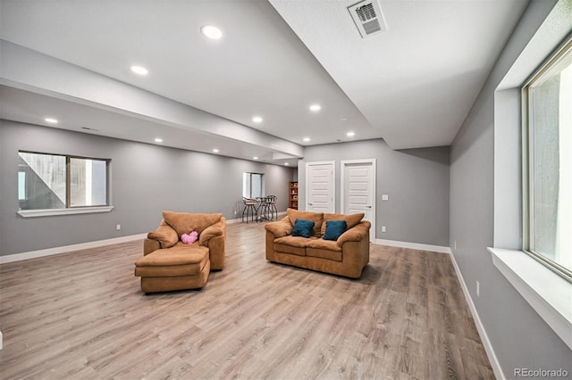 11059 E 25th Dr, Aurora, CO 80010 - living area with light wood-type flooring, plenty of natural light, and recessed lighting