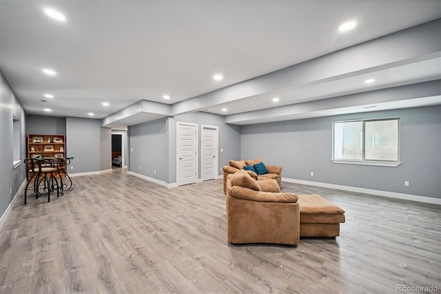 11059 E 25th Dr, Aurora, CO 80010 - living area featuring light wood-style floors and recessed lighting