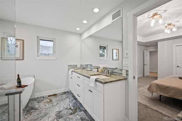 bathroom featuring a bathtub and vanity