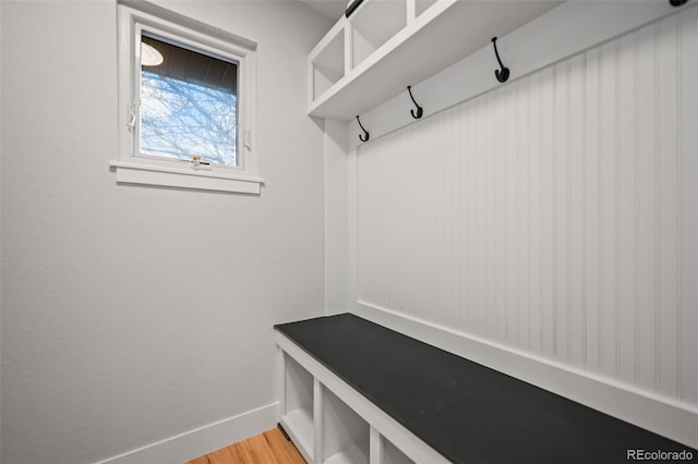 mudroom with light hardwood / wood-style floors