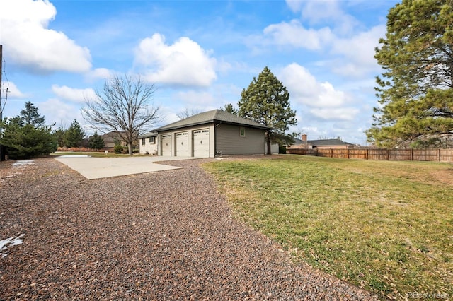 view of yard featuring a garage